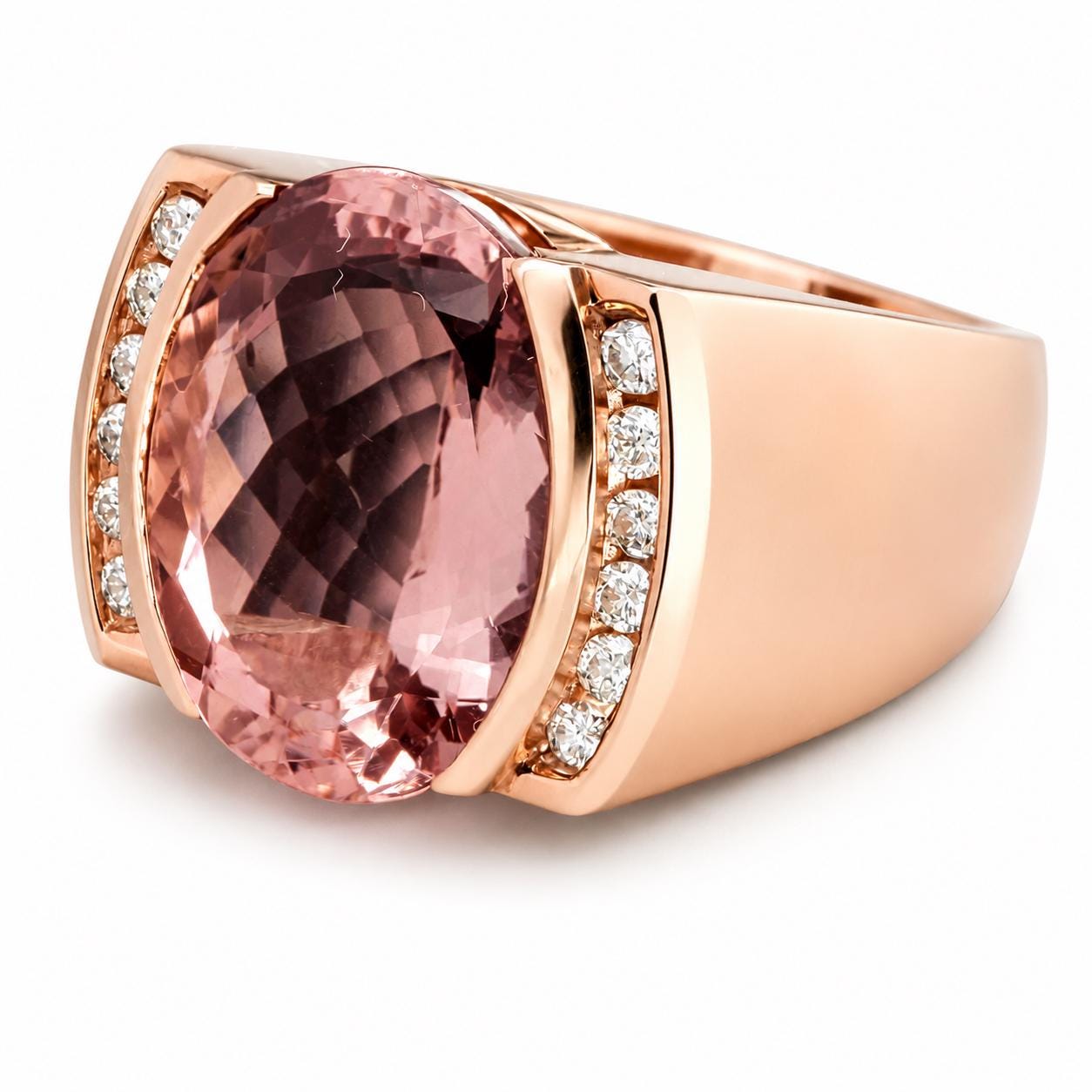 A gold ring with a large pink gemstone, possibly a pink gemstone like a piece of jade or a pink topaz. The ring has a rose gold band and is adorned with small diamonds along the edges.