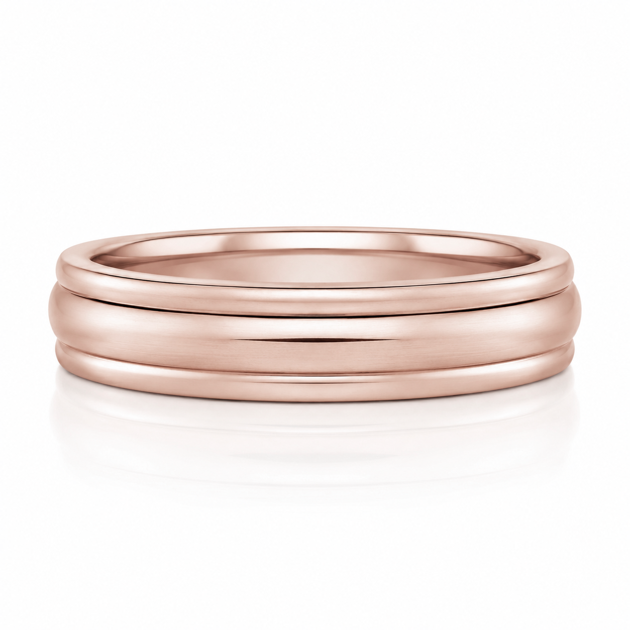 A rose gold ring with a simple, elegant design.