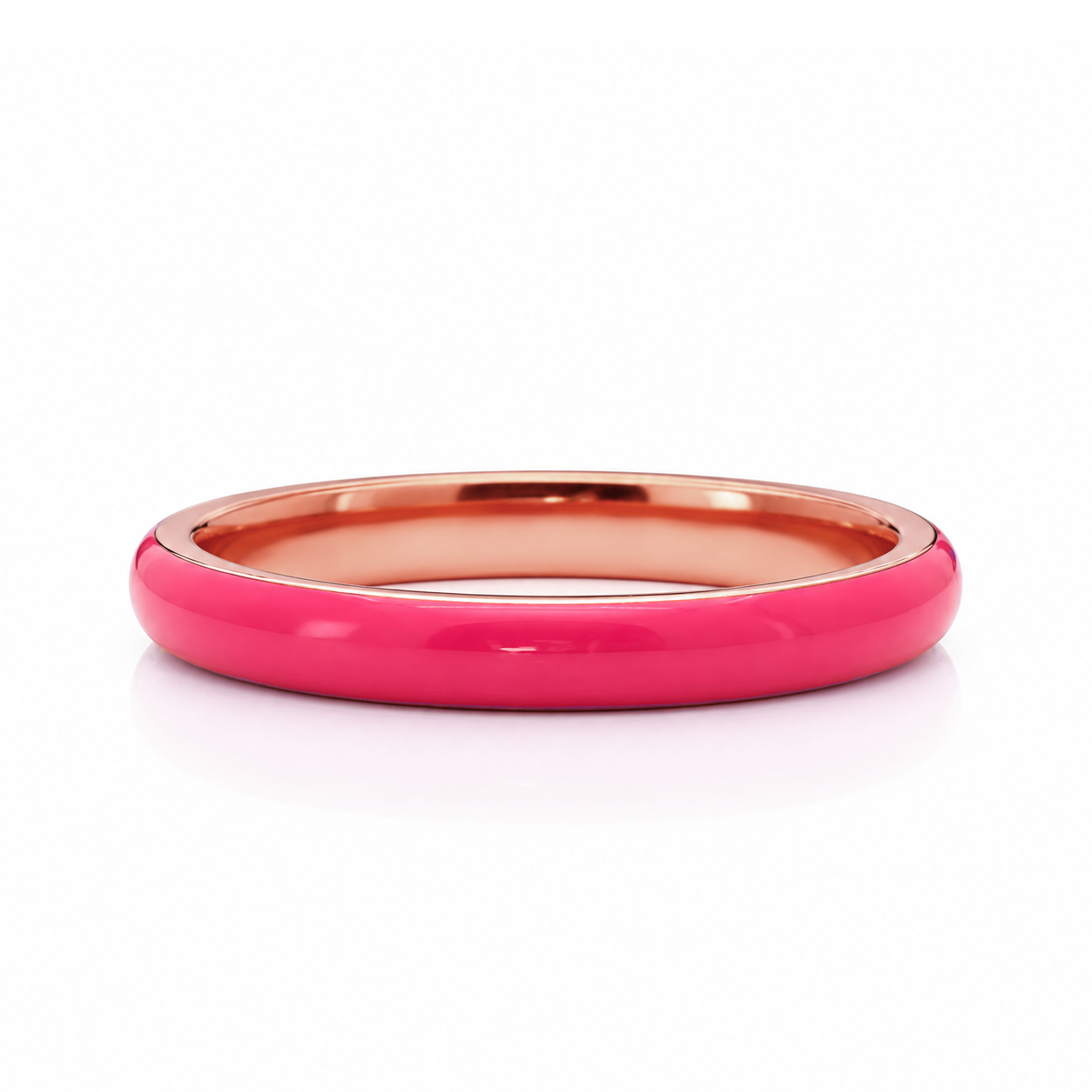 A bright pink, shiny bracelet with a copper-colored band.