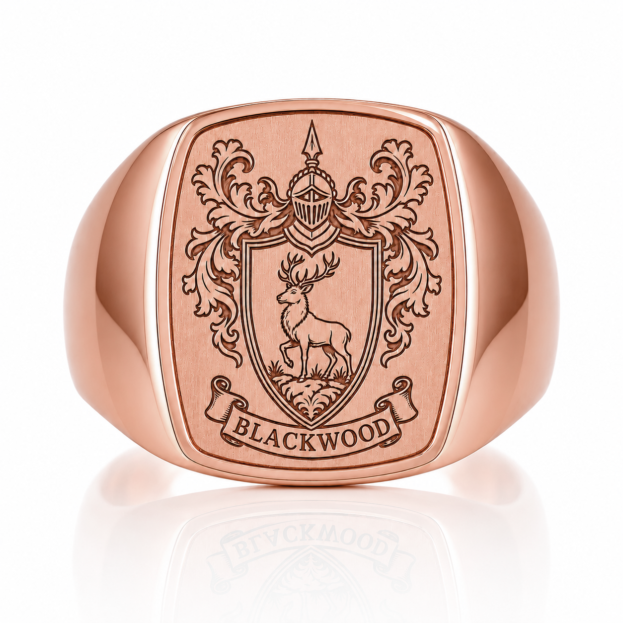 A rose gold ring with a shield-shaped crest featuring a deer and the word "BLACKWOOD" below it.