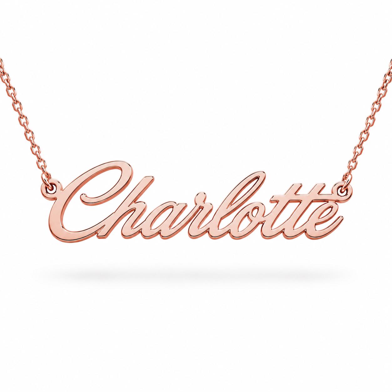 A necklace with the name "Charlotte" engraved on it.
