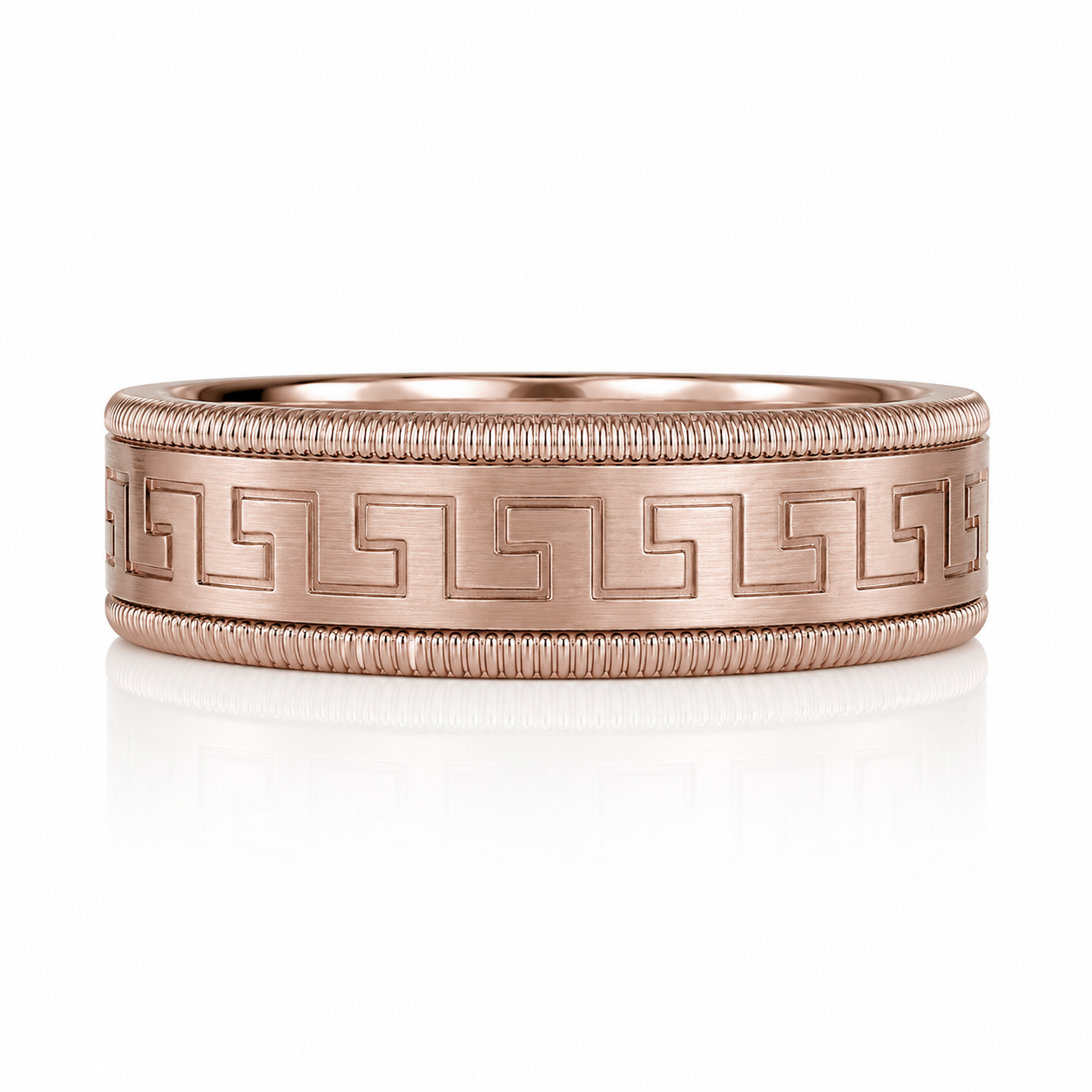 A gold-colored ring with a decorative pattern around the edge.