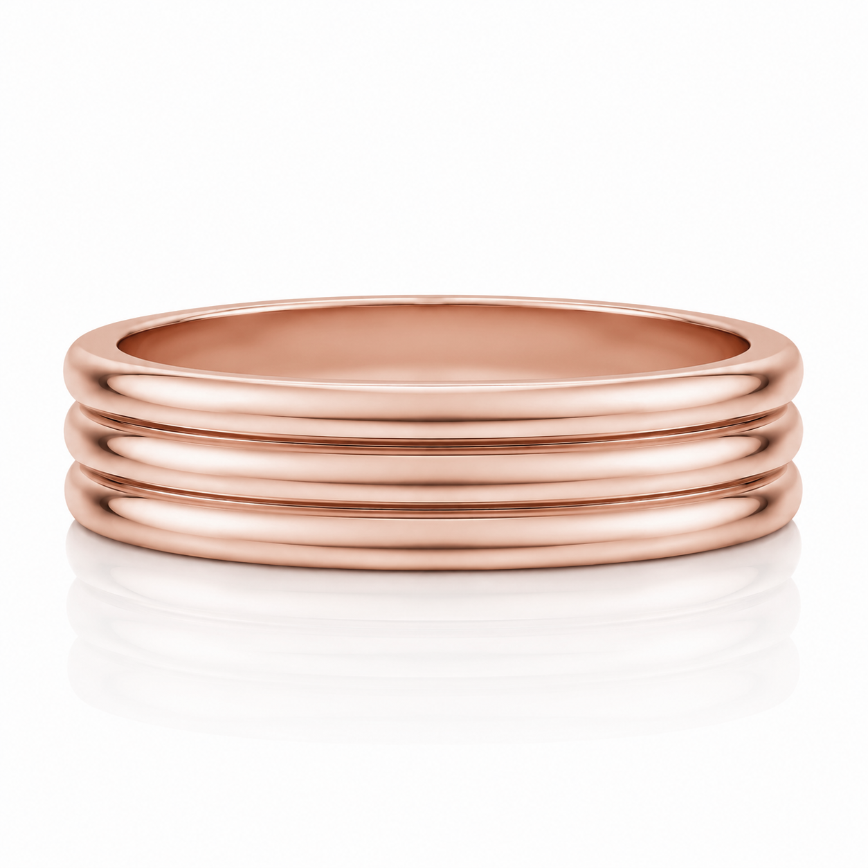 A close-up image of a shiny, copper-colored ring with three concentric bands.