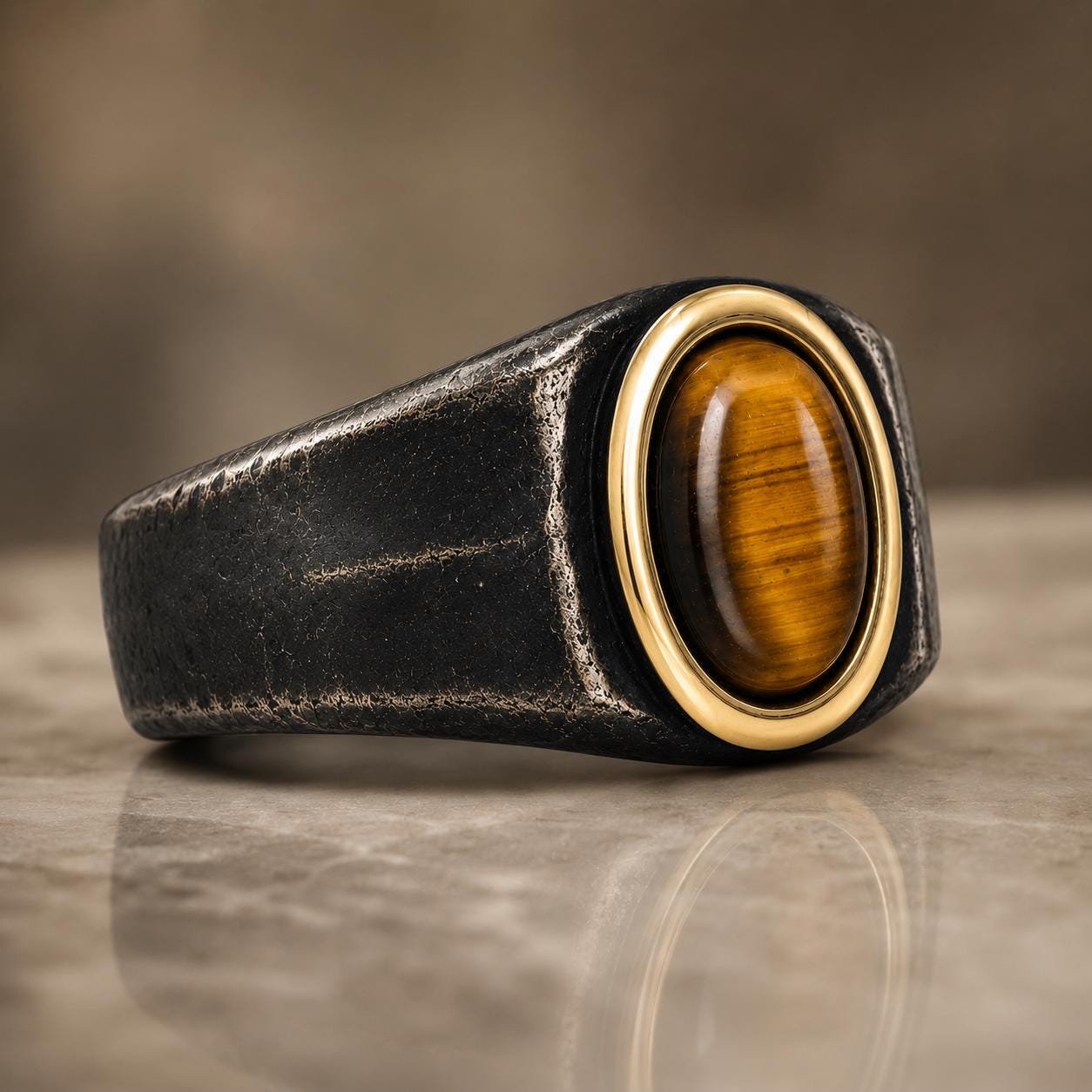 A close-up image of a black leather band with a gold-colored gemstone, possibly a tiger eye, set in the center.
