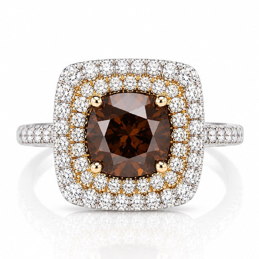 A diamond ring with a large, round-cut brown diamond at the center, surrounded by a halo of smaller diamonds set in a silver band.