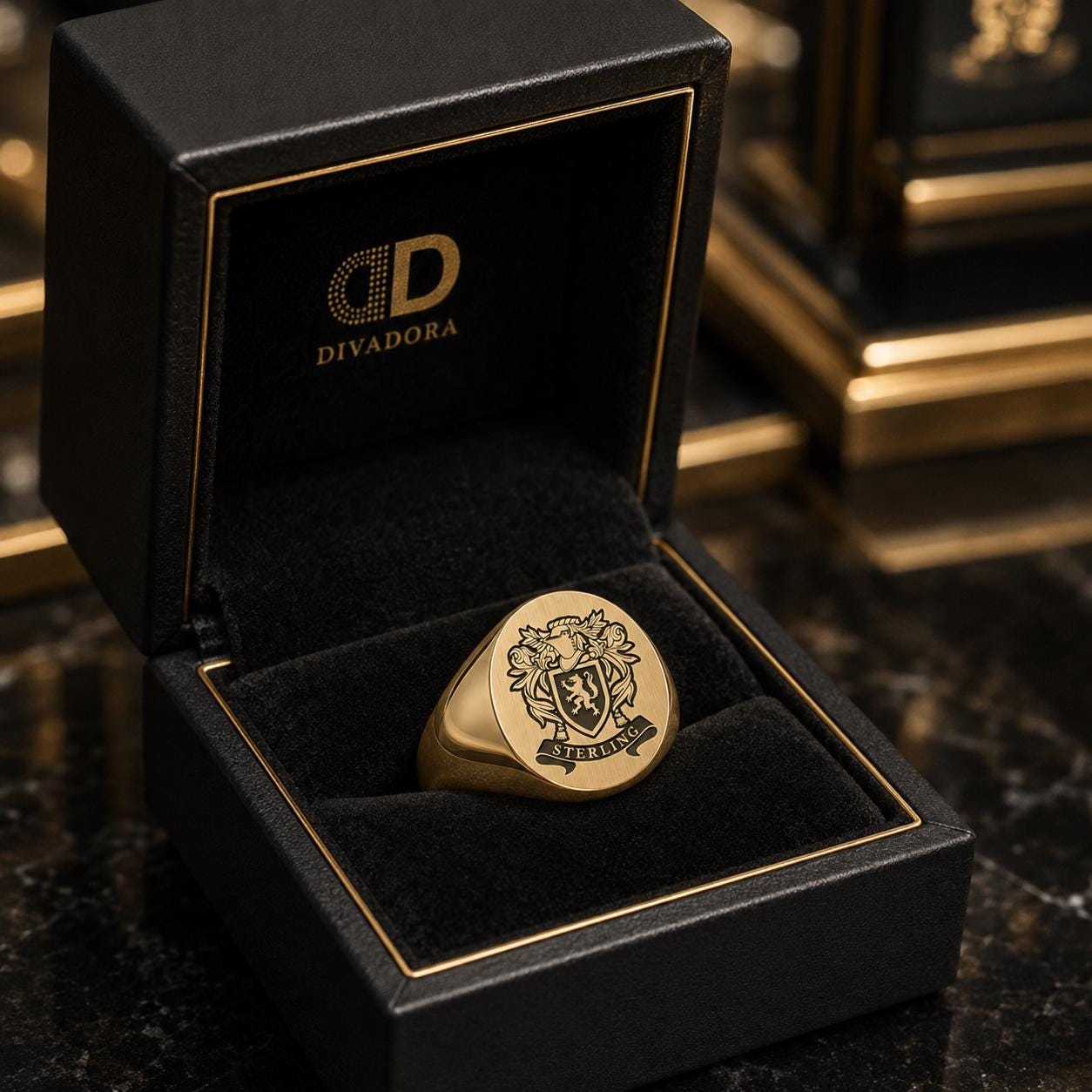 A gold ring is displayed in a black box with a gold border, placed on a marble surface.