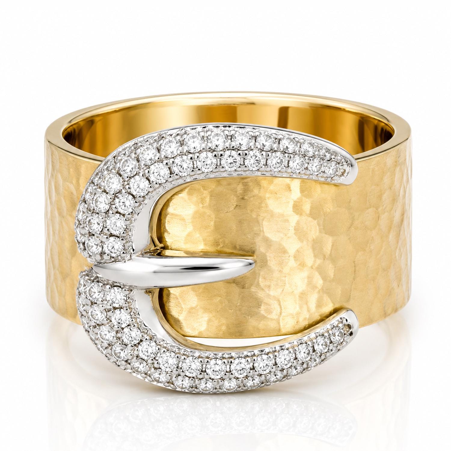 A gold ring with a large diamond-encrusted buckle-shaped design.