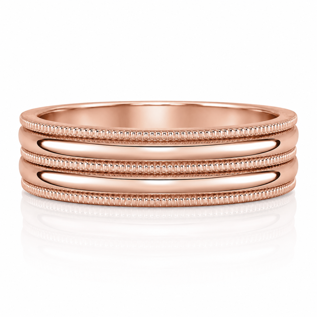 A rose gold ring with three concentric bands, showcasing a textured and ornate design.