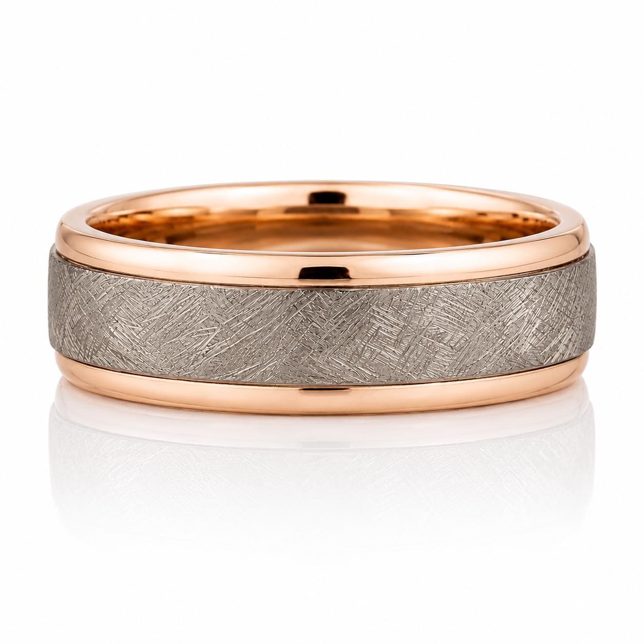 A gold-toned ring with a metallic texture, featuring a band with a metallic texture and a metallic band.