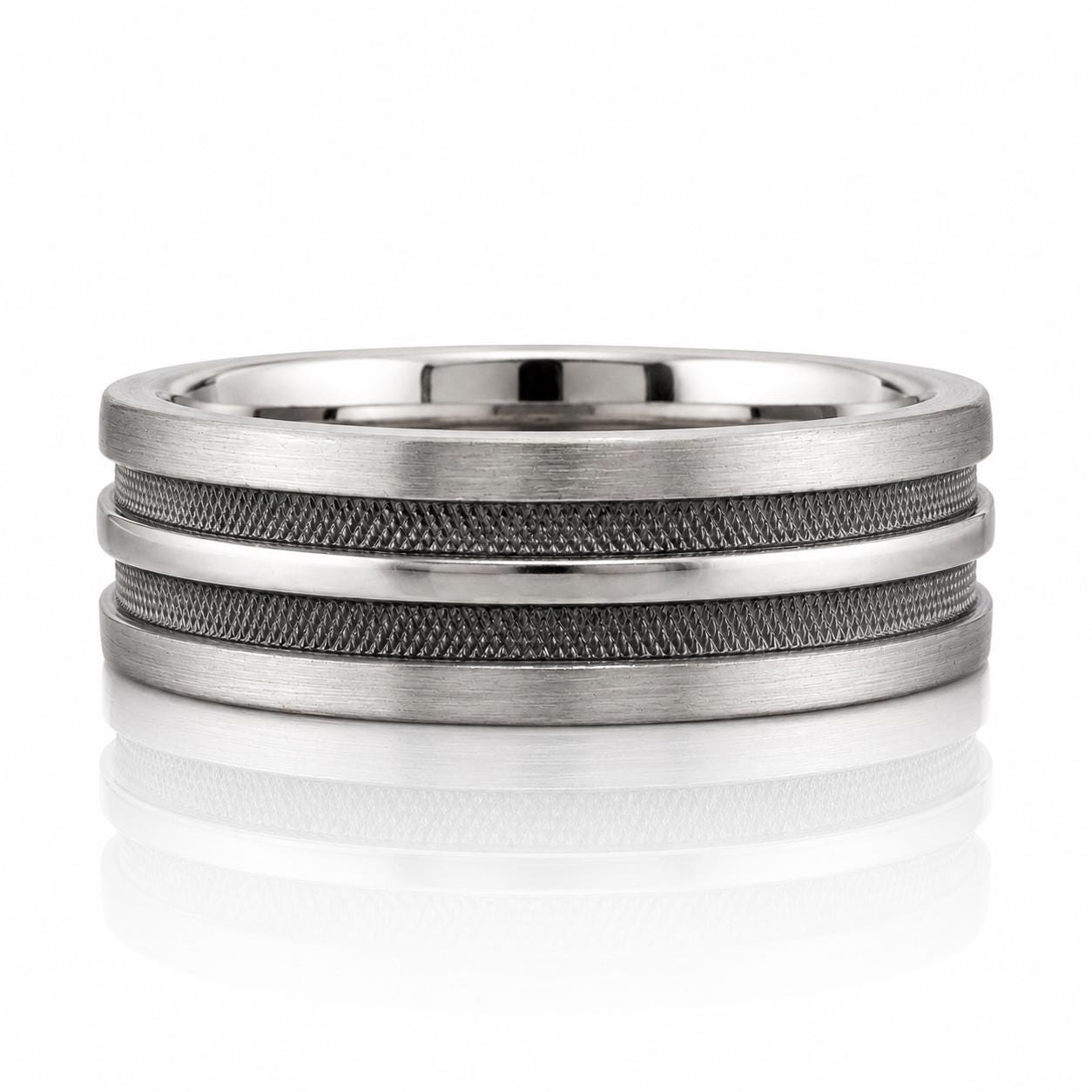 A silver ring with a unique design featuring three concentric bands of metal.