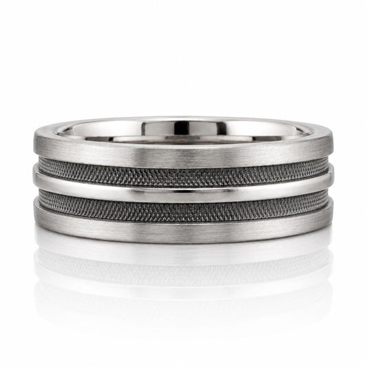 A silver ring with a unique design featuring three concentric bands of metal.