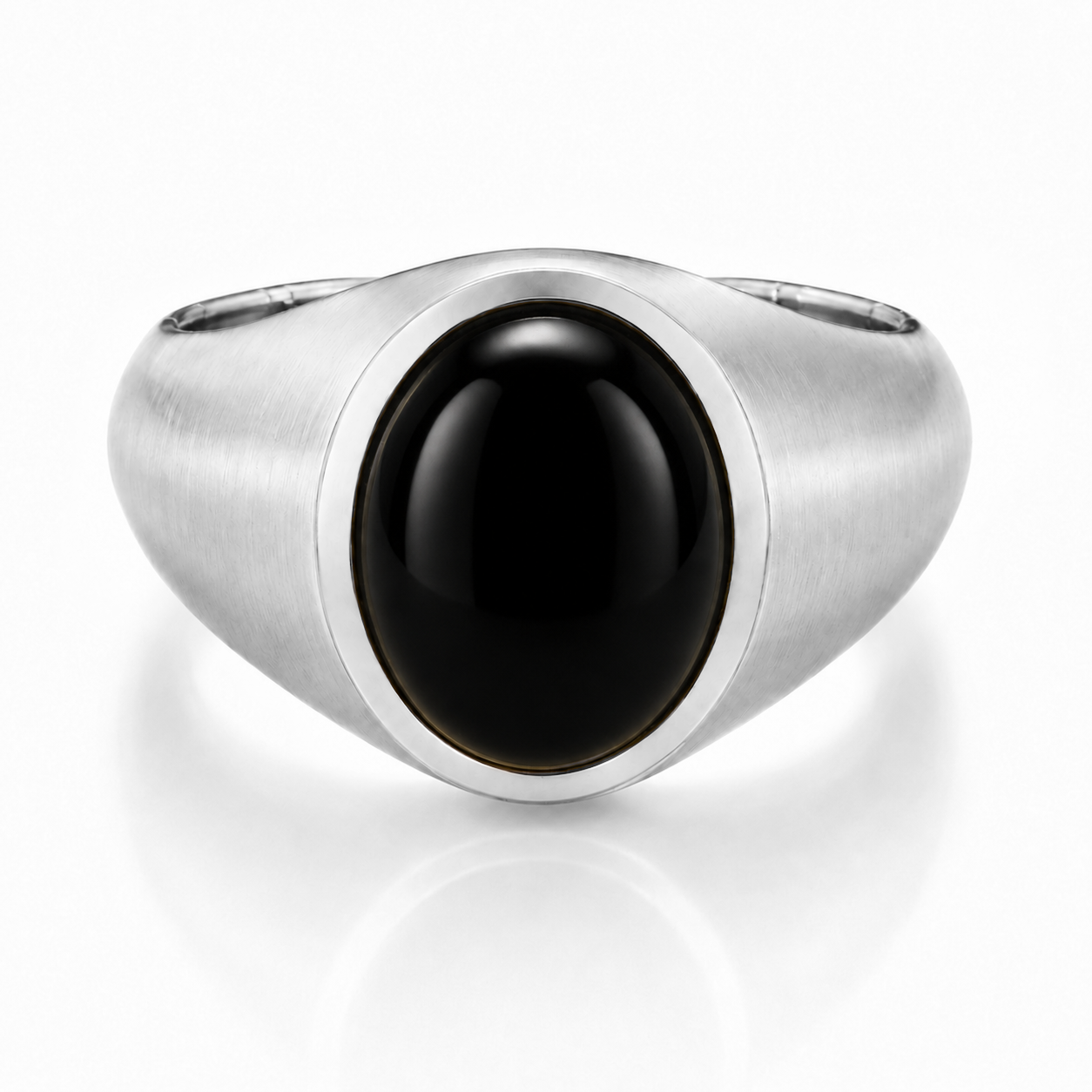 A silver ring with a large black gemstone in the center.