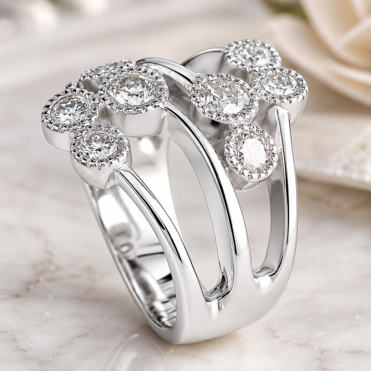 A silver ring with a unique design, featuring a cluster of small diamonds arranged in an intricate pattern.