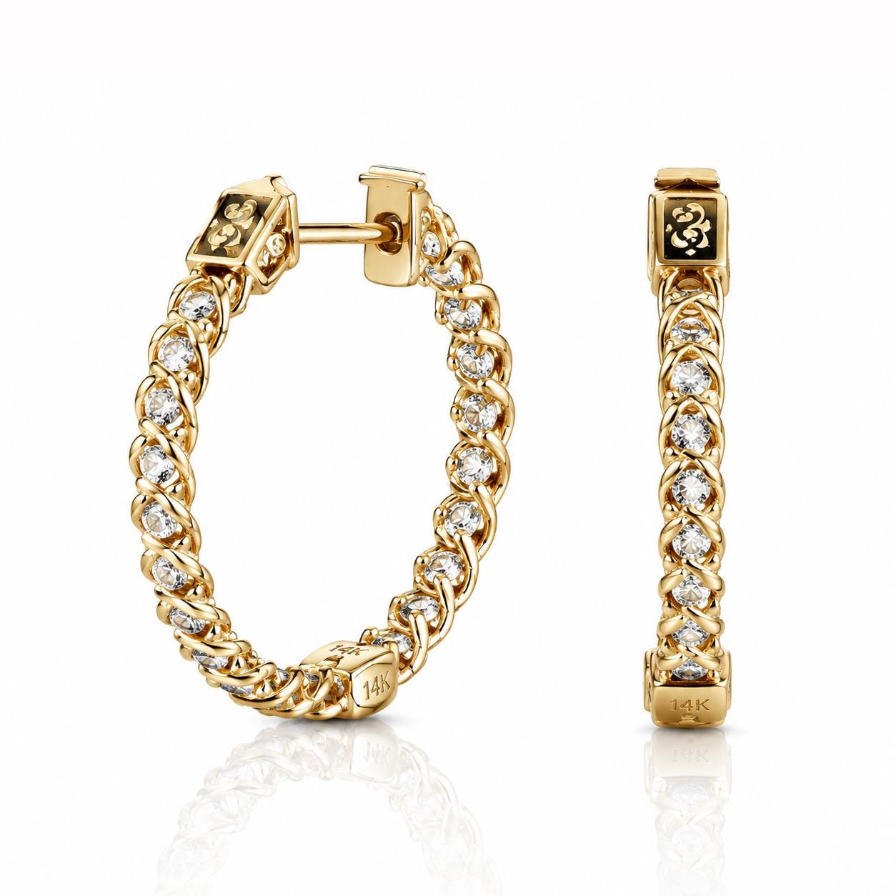 a pair of gold-colored earrings with a chain-link design and small diamonds set in the center.