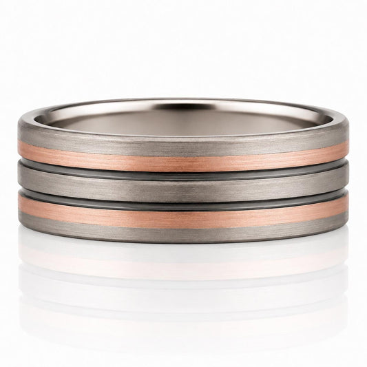 A silver ring with three concentric bands of different colors - gray, copper, and black.