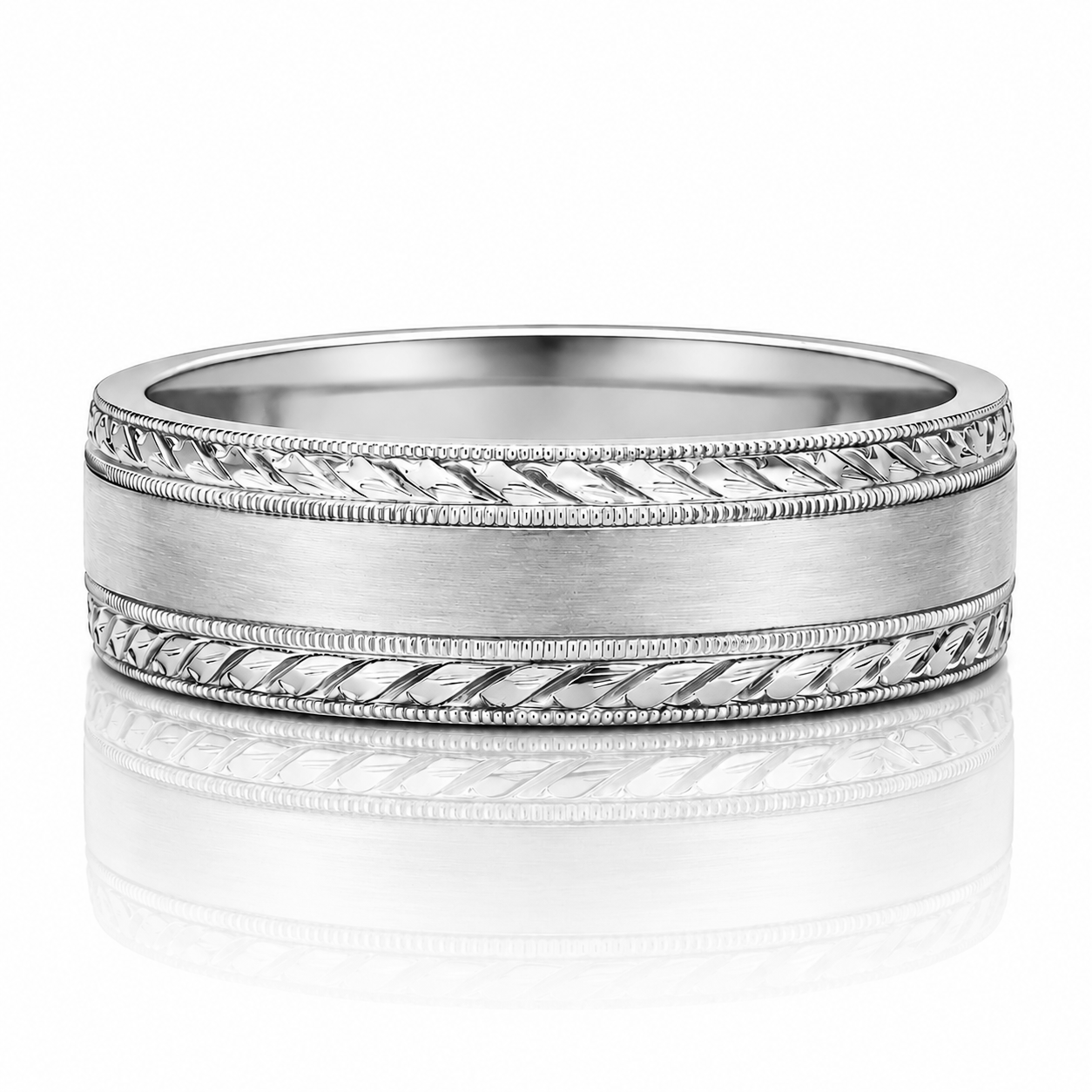 A silver-colored ring with a decorative band design.