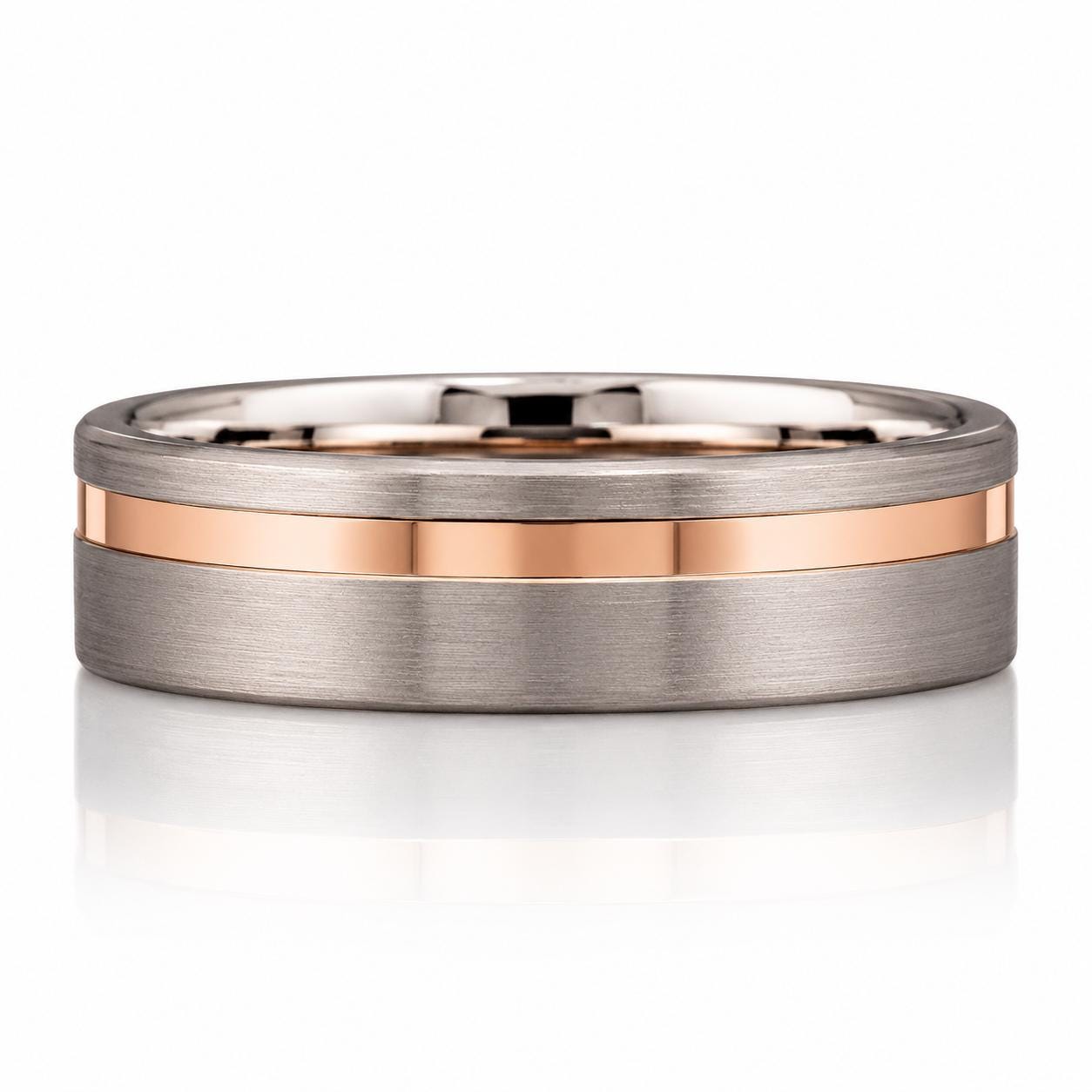 A silver and rose gold ring with a thin band.