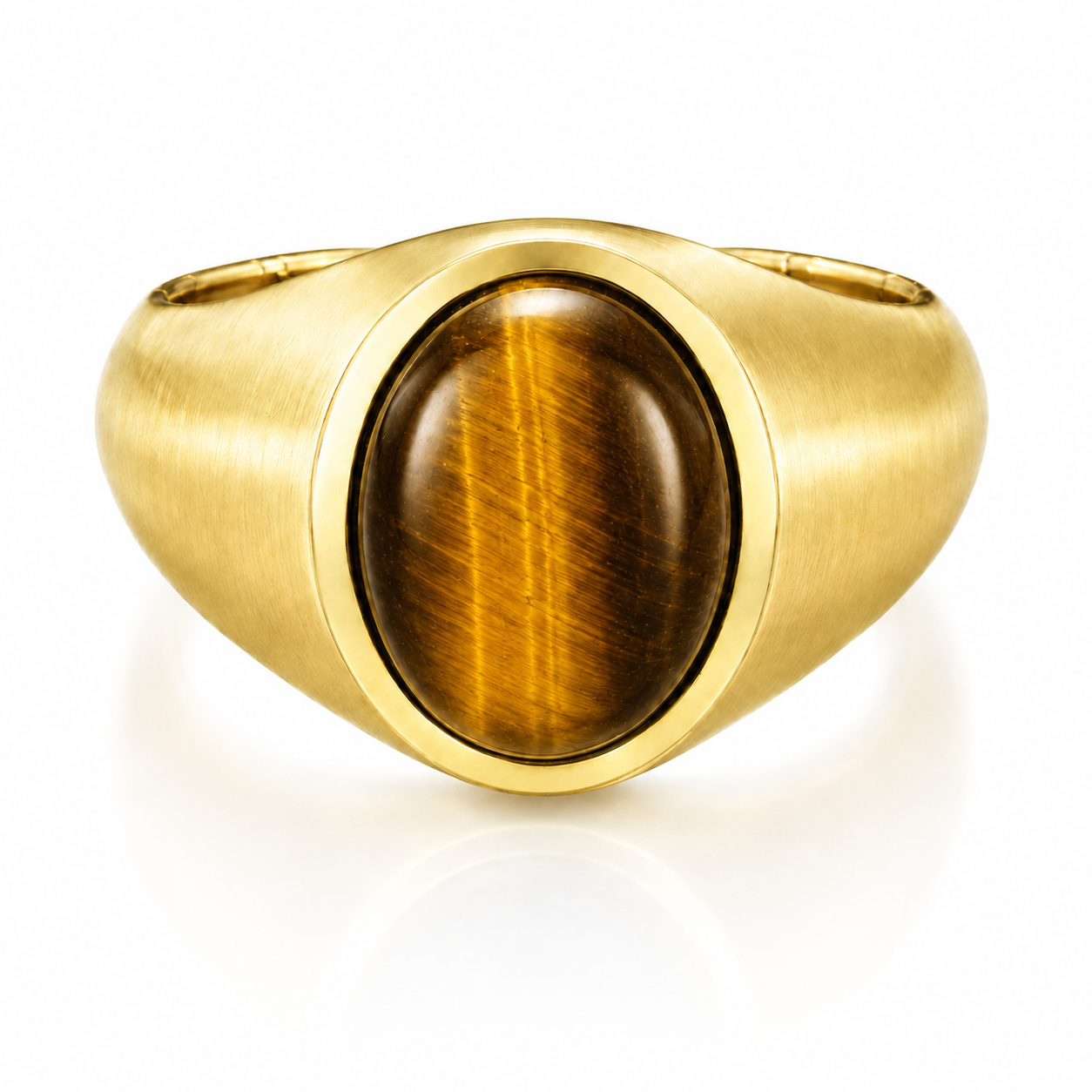 A gold ring with a large, round, amber-colored gemstone in the center.