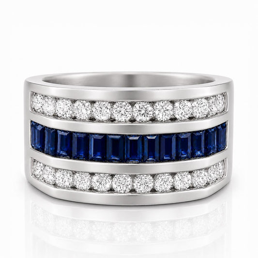 A silver ring with a row of diamonds and blue gemstones.