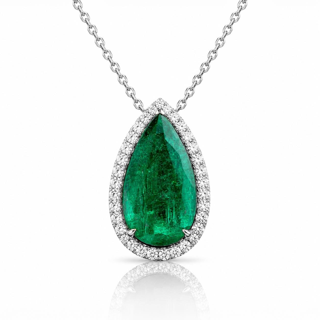 A necklace with a large, bright green gemstone set in a diamond-encrusted frame.