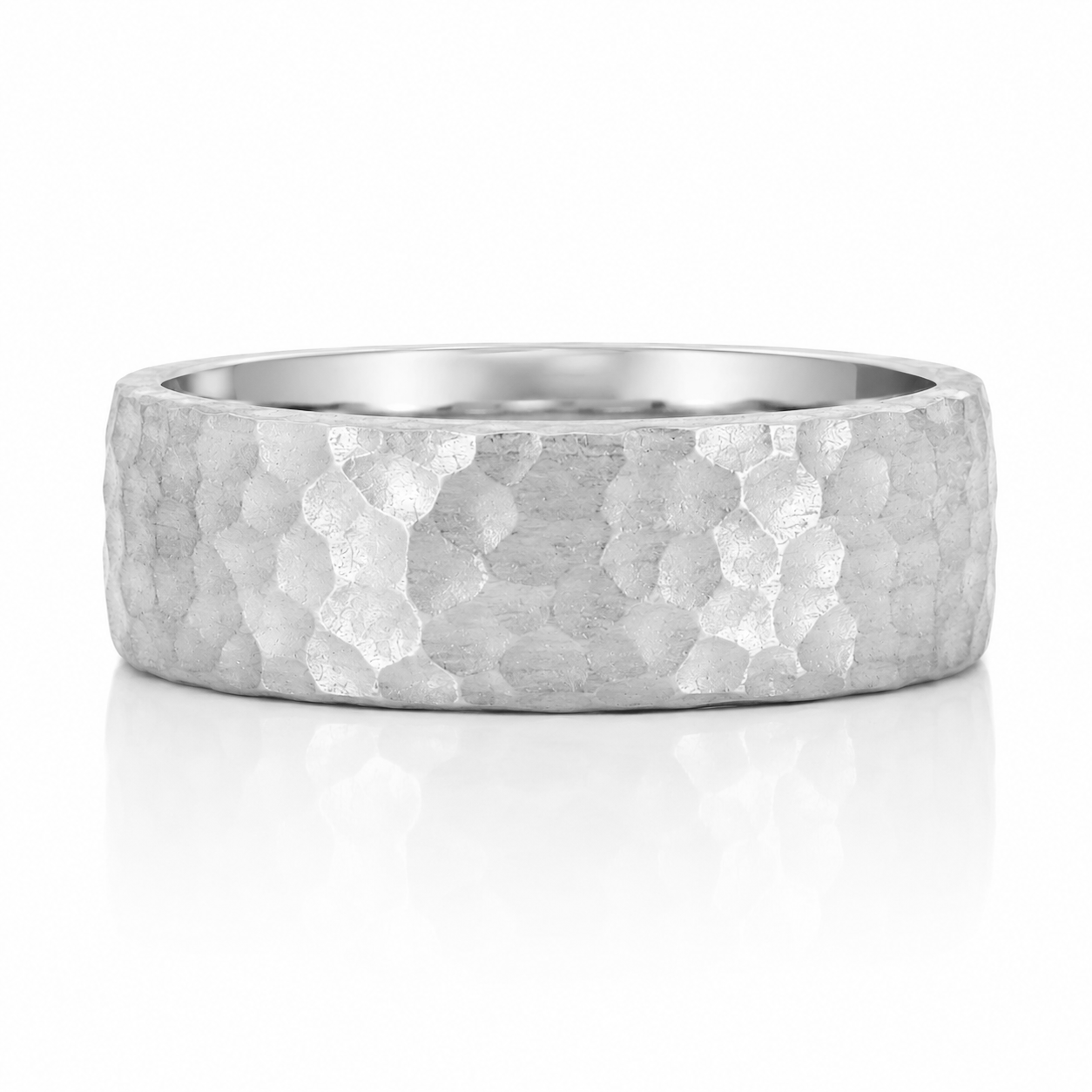 A silver-colored ring with a textured, embossed surface.