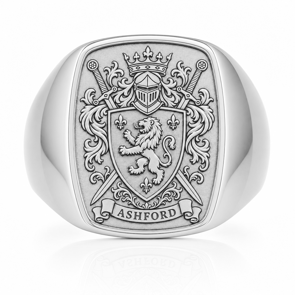 A silver ring with an intricate design featuring a lion, a crown, and a banner with the name 'ASHFORD'.