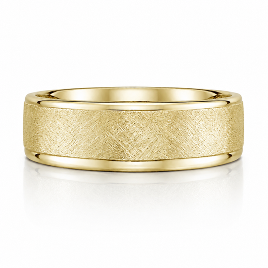 A gold ring with a textured band design.