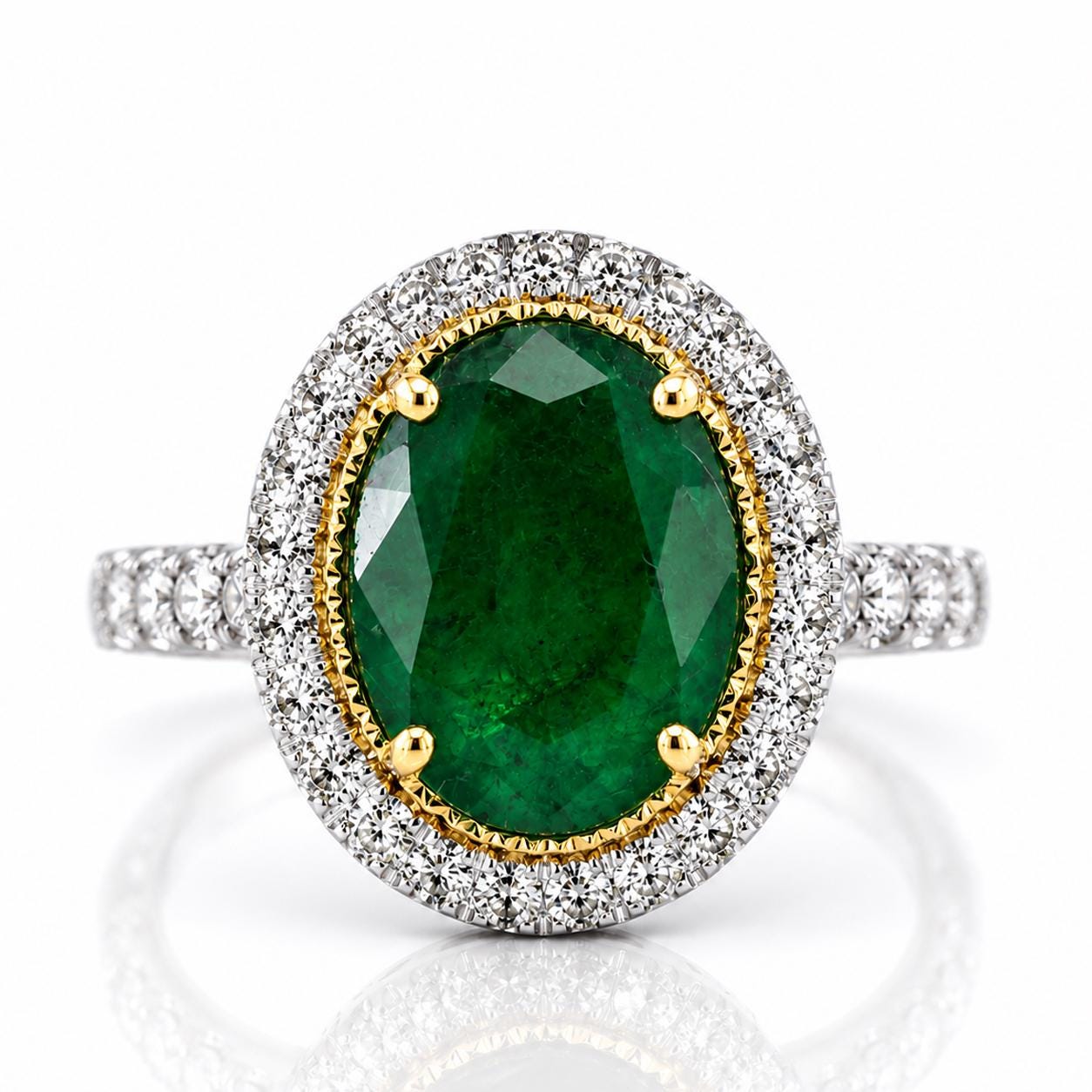 A stunning ring featuring a large oval-shaped green gemstone surrounded by a halo of smaller diamonds set in a silver band.