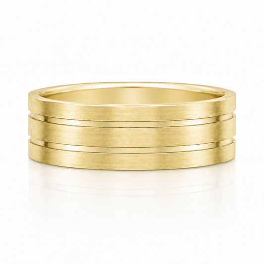 A gold ring with three concentric bands, showcasing a simple yet elegant design.