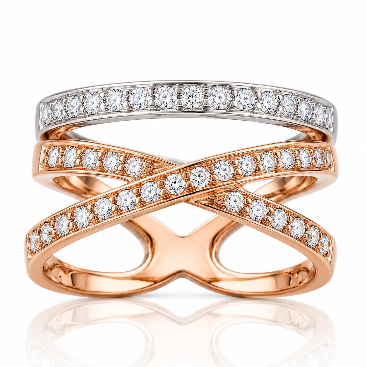 three rings with a combination of silver and gold tones, adorned with numerous small diamonds.