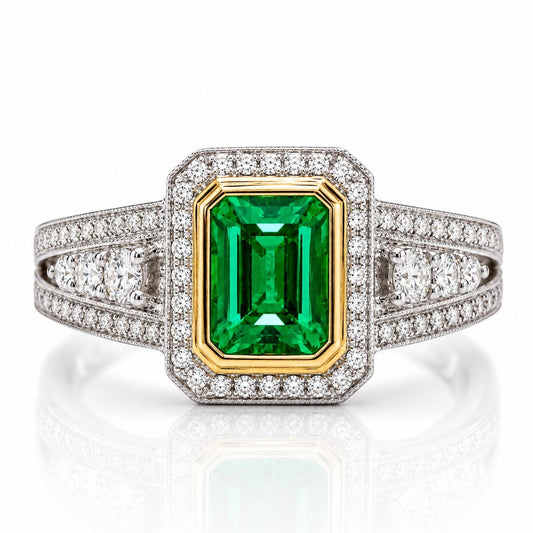 A diamond ring with a large, green gemstone in the center, surrounded by smaller diamonds.