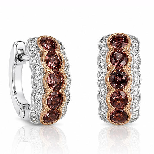 a pair of elegant earrings with a row of six round gemstones set in a silver and gold design.