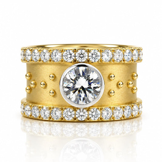 A gold ring with a large central diamond surrounded by smaller diamonds, set in a ring band with a row of small diamonds along the edge.