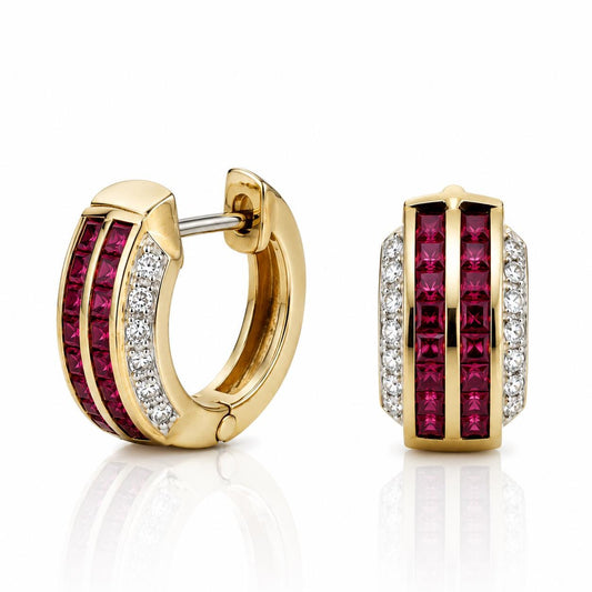two gold earrings with red gemstones, including diamonds.