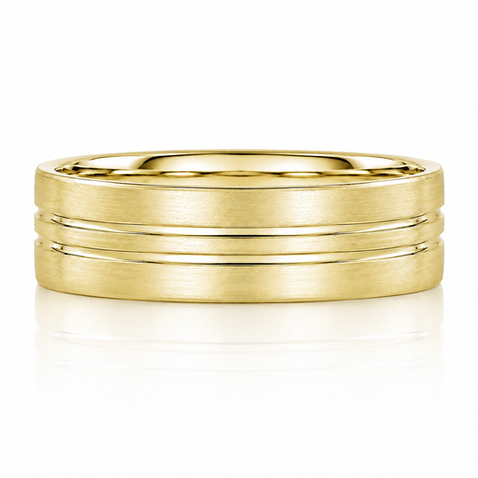 A gold ring with a textured band design.