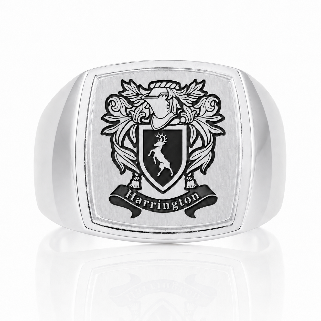 A silver ring with a crest design featuring a shield with a lion and the word "Harrington" below it.