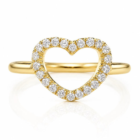 A gold ring with a heart-shaped cutout in the center, surrounded by a row of small diamonds.