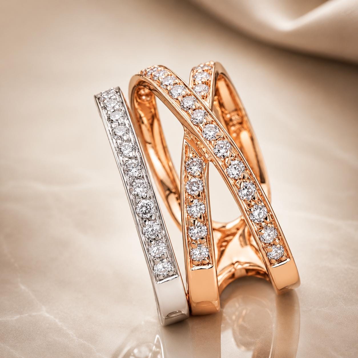 A close-up image of two ornate rings with a combination of gold and silver tones, adorned with numerous small diamonds.