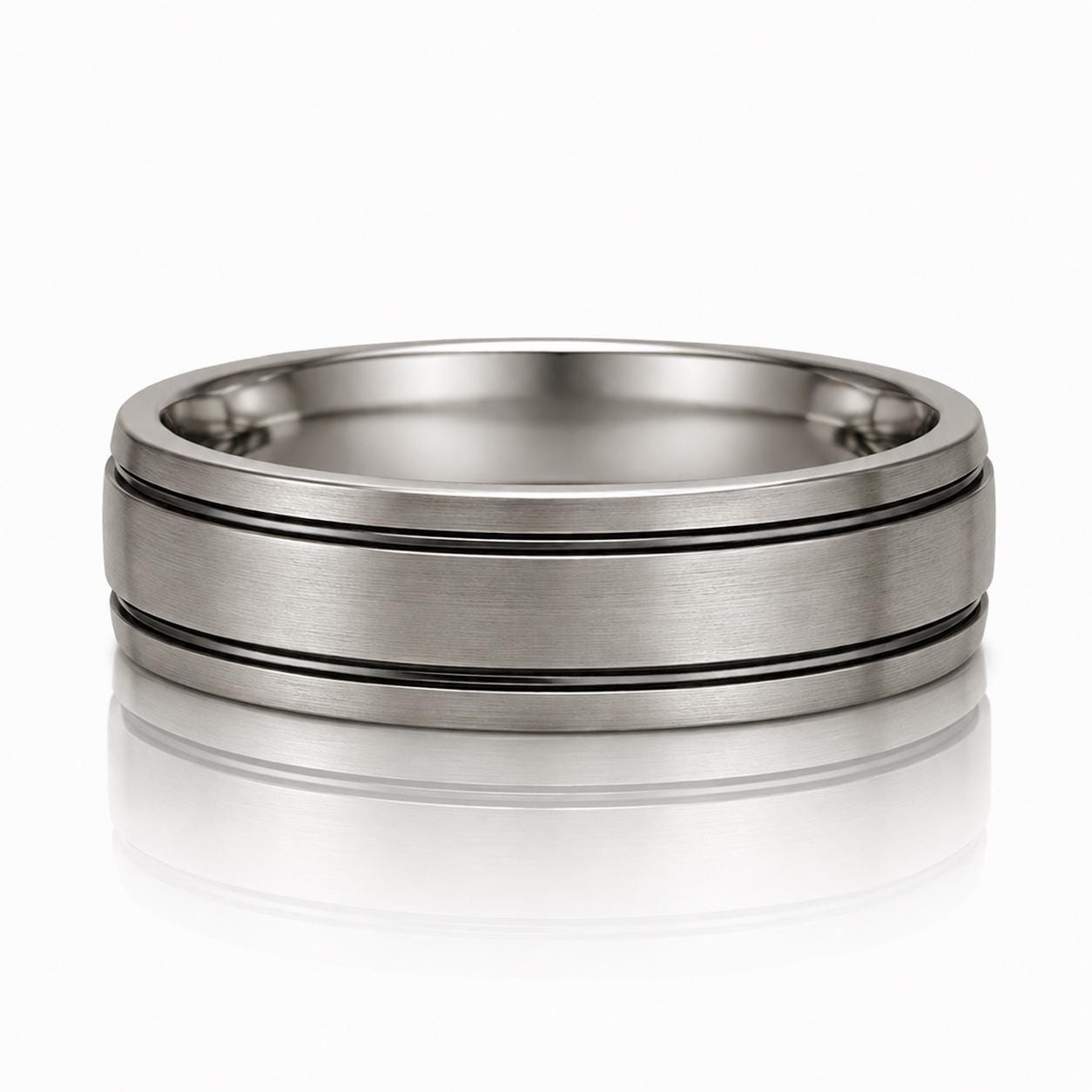 A silver-colored ring with a horizontal band design.