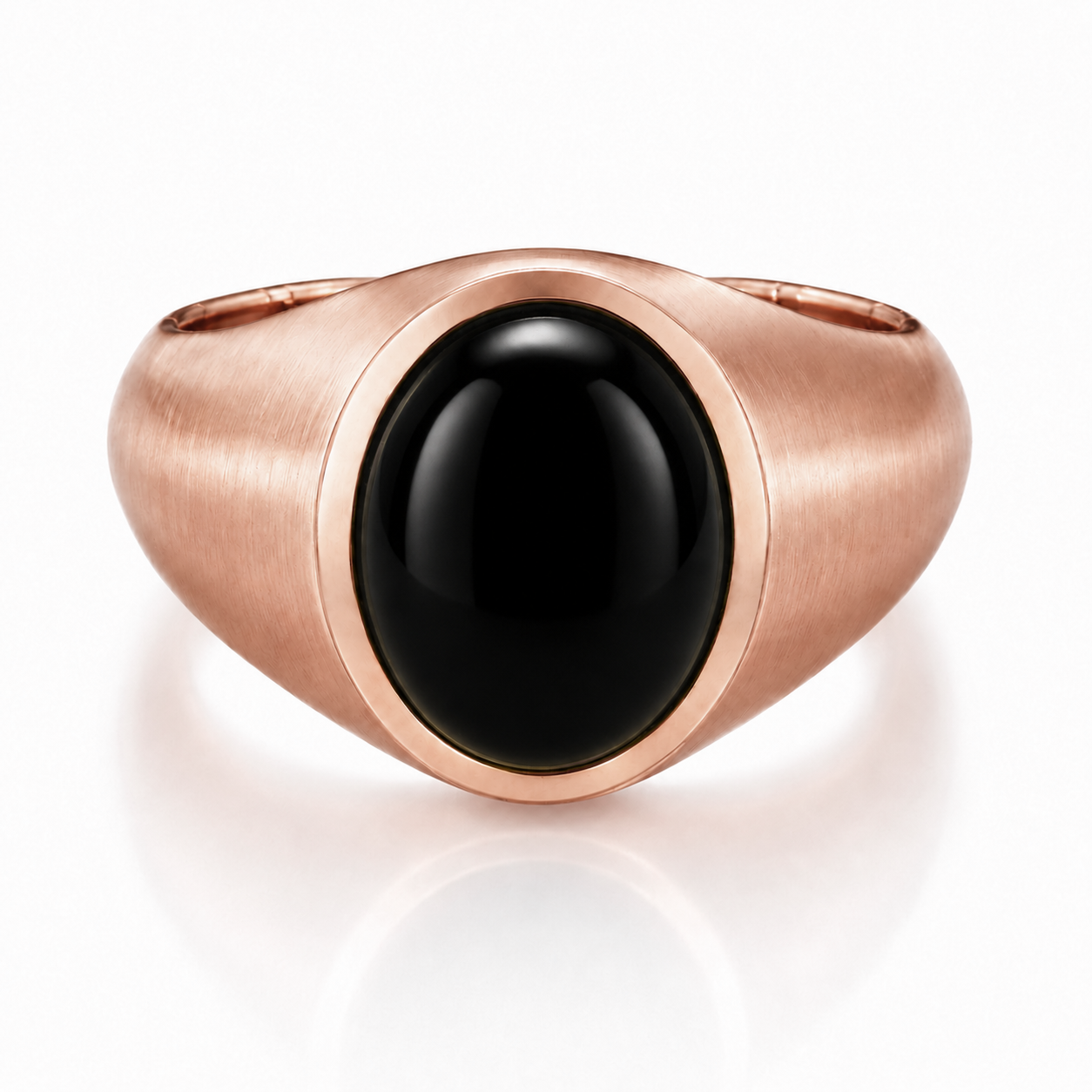 A rose gold ring with a large black gemstone in the center.