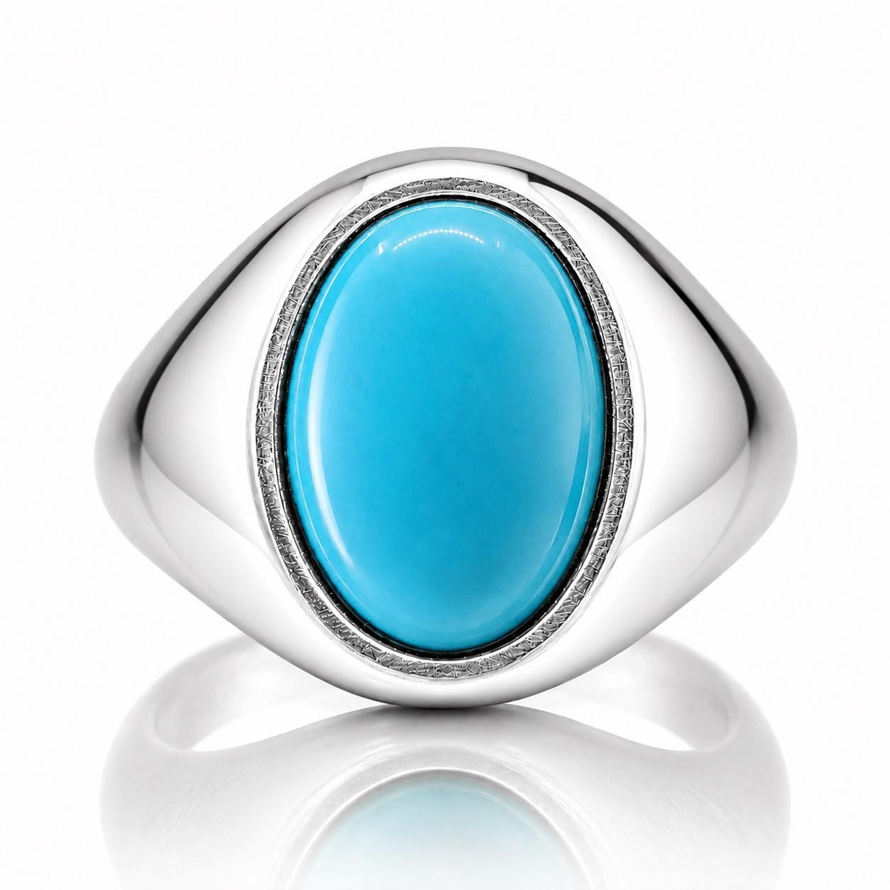 A silver ring with a large, bright blue oval-shaped gemstone in the center.