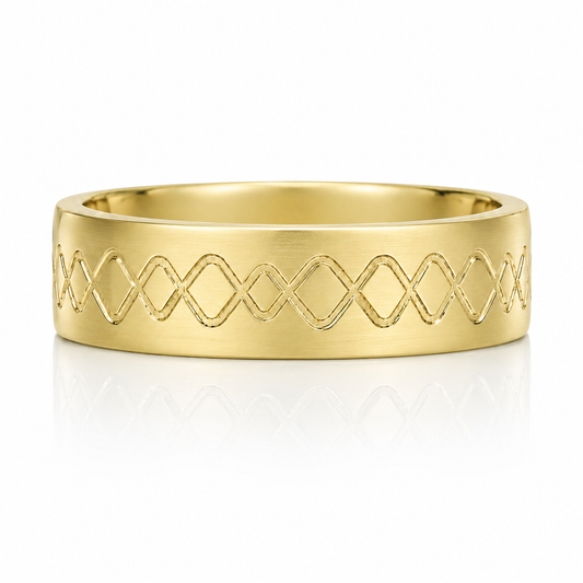 A gold ring with a diamond pattern embossed on it.