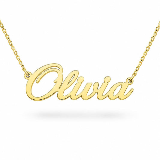A gold necklace with the name "Olivia" engraved on it.