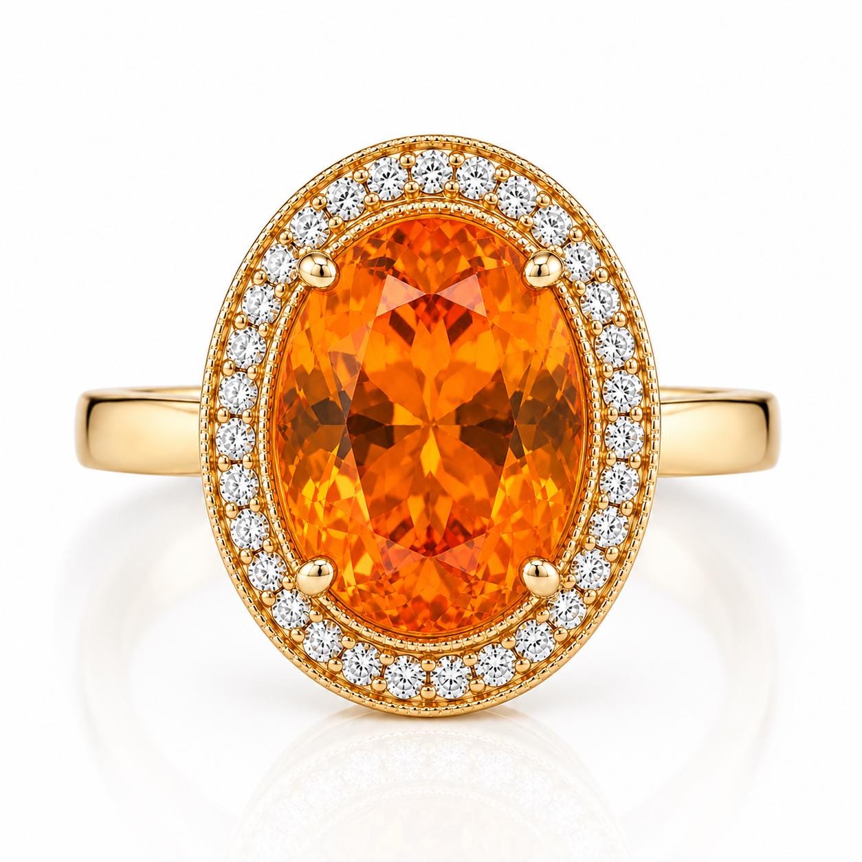 A gold ring with a large oval-shaped gemstone at the center, surrounded by a halo of smaller diamonds.
