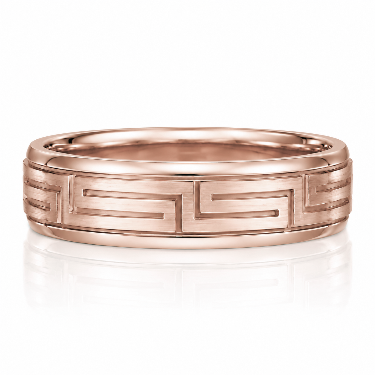 A rose gold ring with a Greek key pattern design.