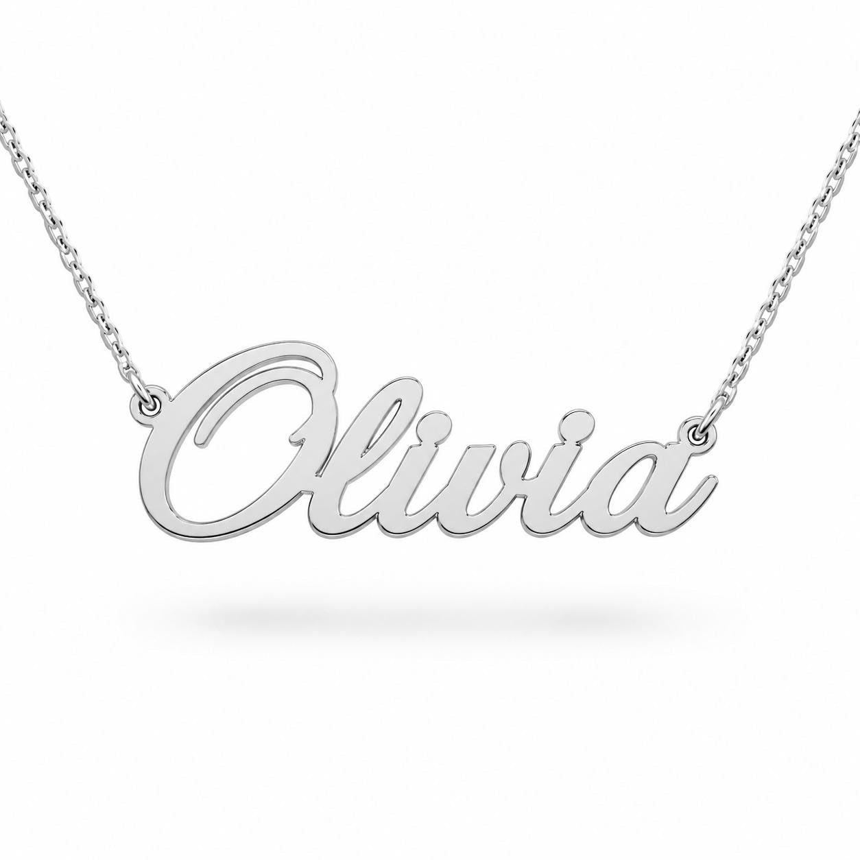 A silver necklace with the name "Olivia" engraved on it.