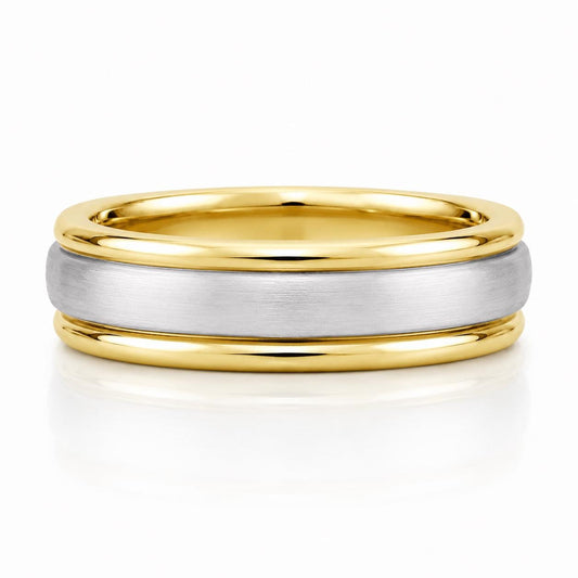 A gold and silver wedding band with a simple, elegant design.