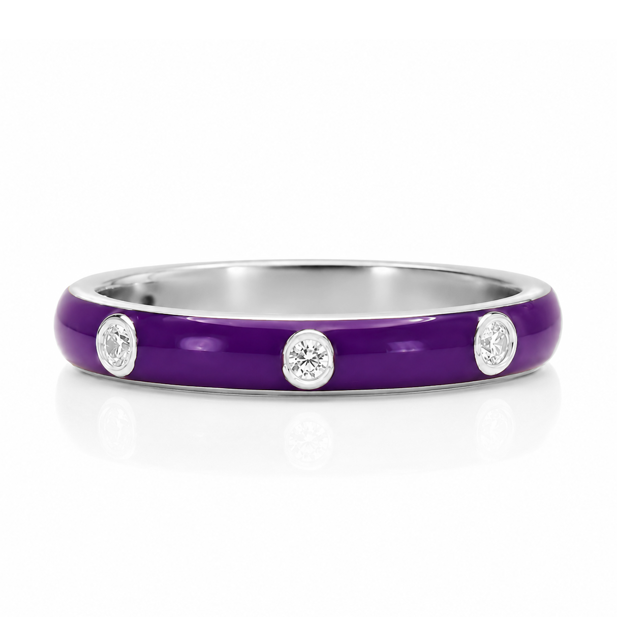 A purple ring with three small diamonds set in the center.
