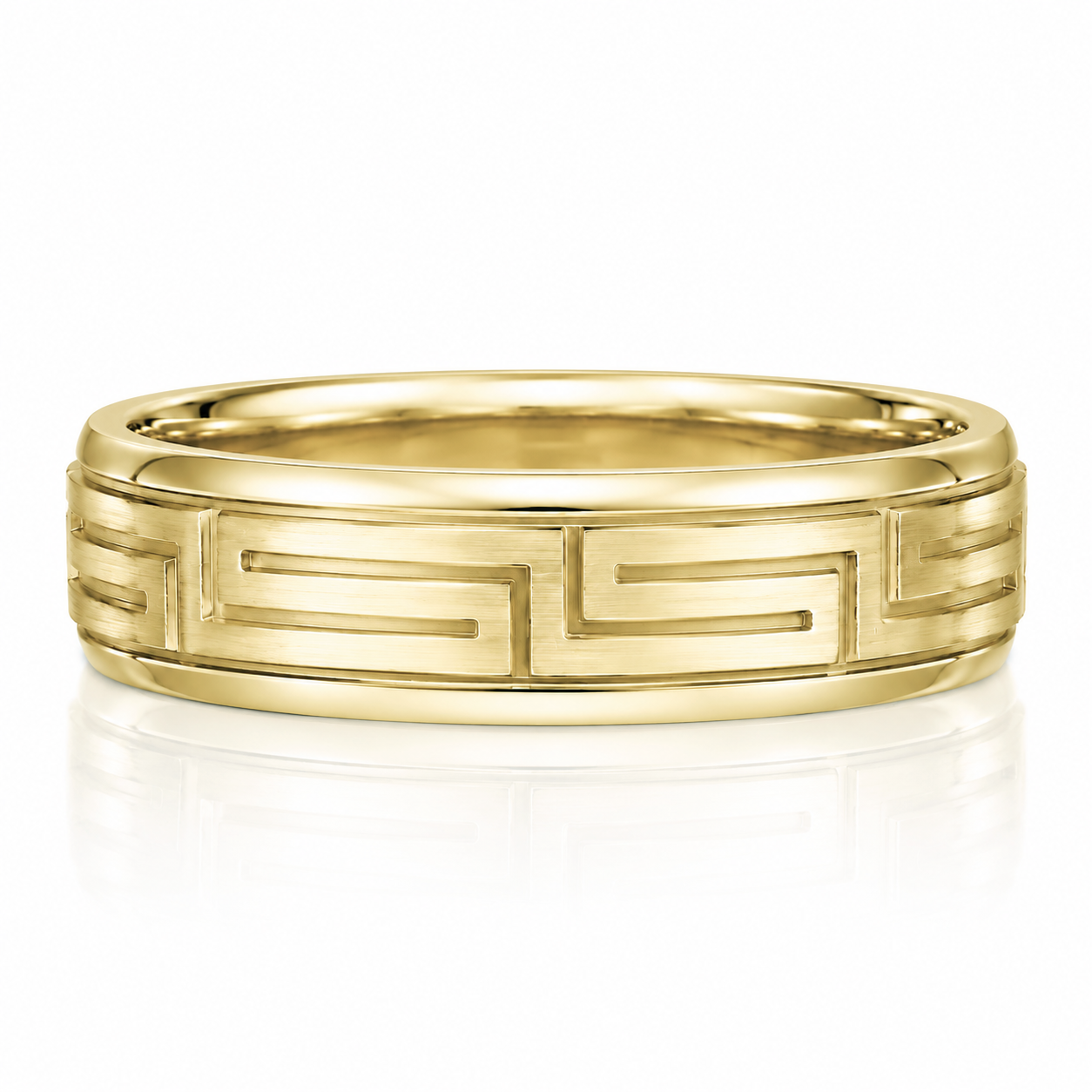 A gold ring with a Greek key pattern design.