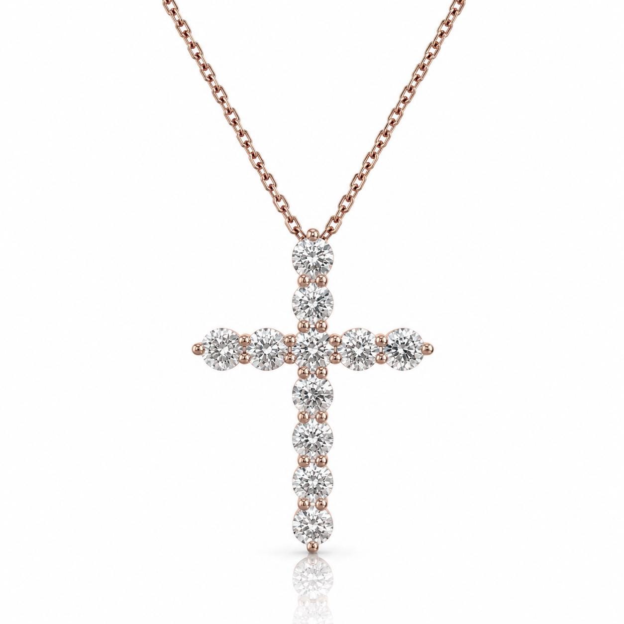A necklace with a large, intricately designed cross pendant made of diamonds.